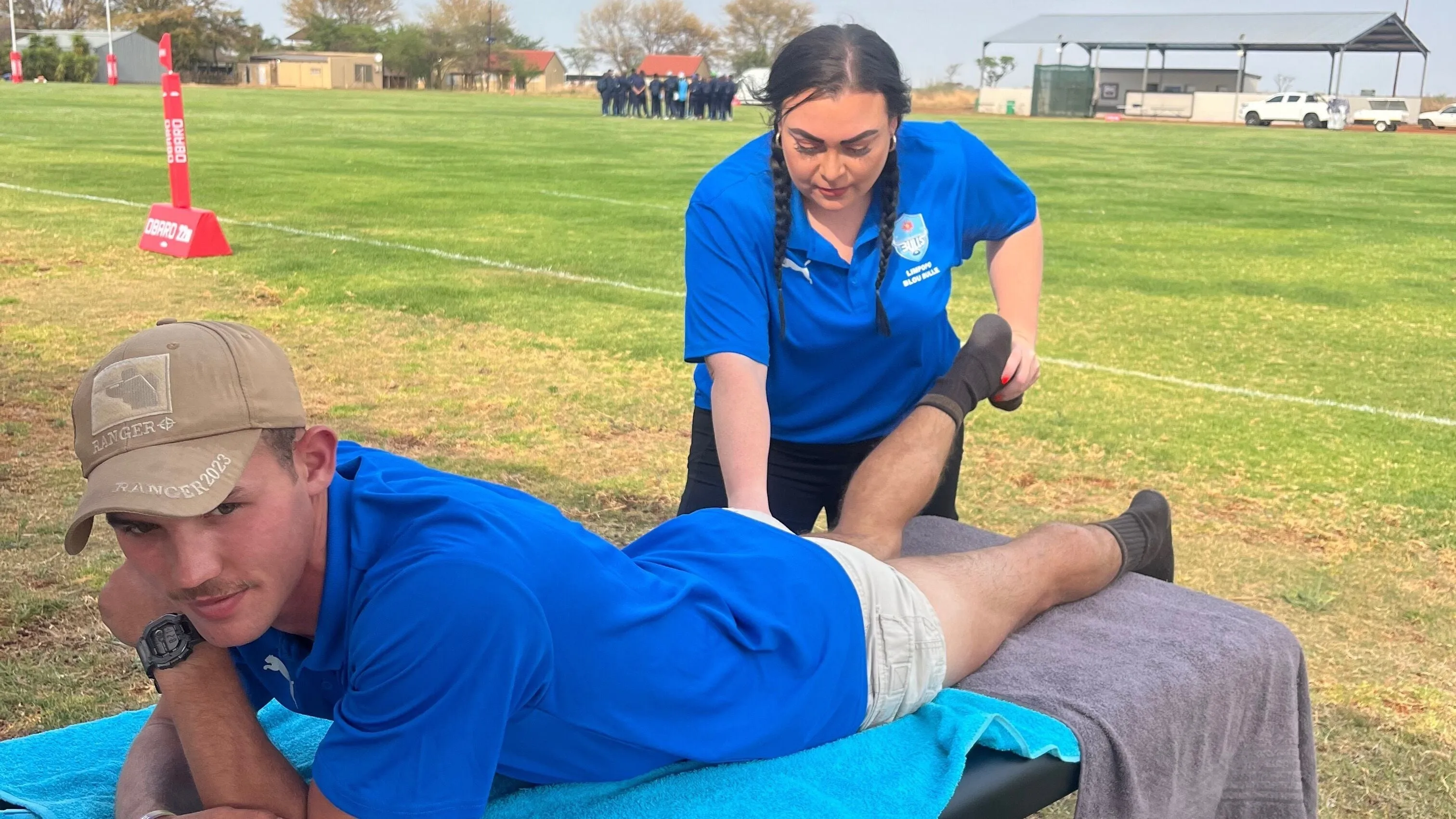 Yvonne treating a rugby player pitch-side